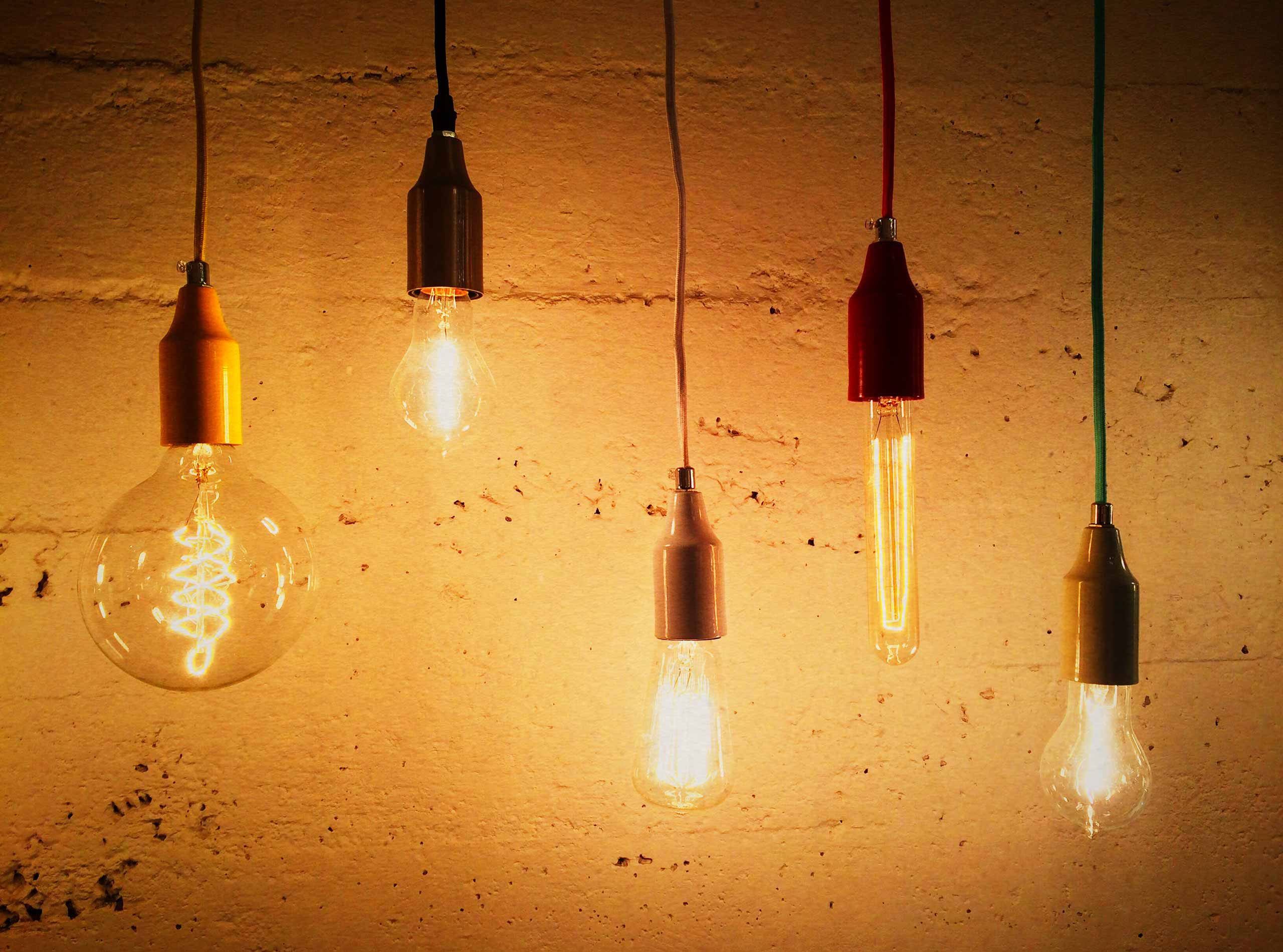 Light bulbs decorating a concrete wall